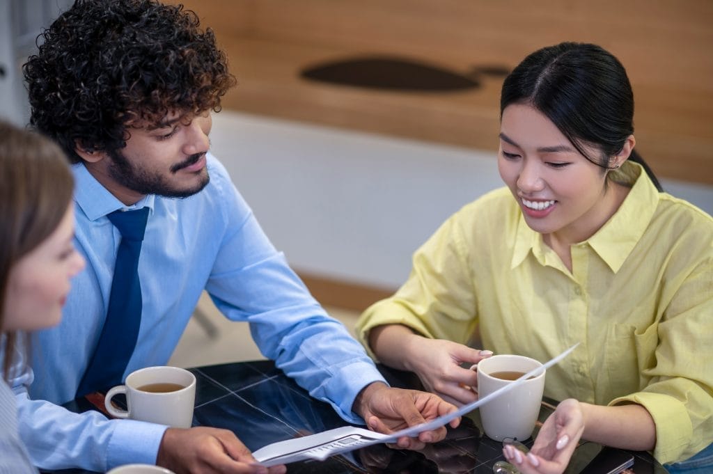 Project work. Team working on the project and looking involved